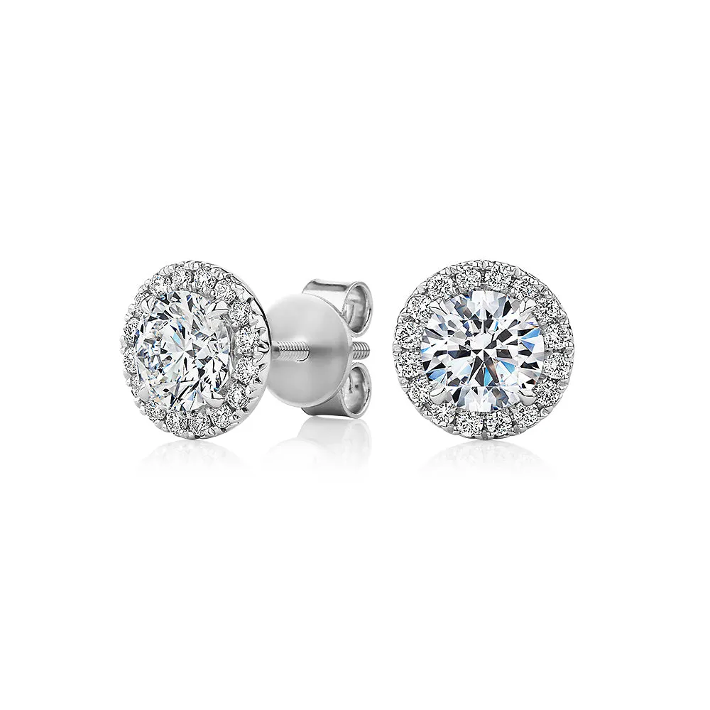 Signature Simulant Diamond 1.67 carat* TW round brilliant halo earrings in 14 carat white gold