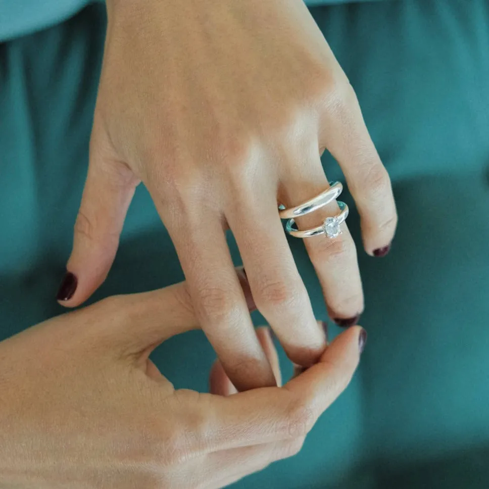 Twin Tusk Ring with Suspended Oval Diamond